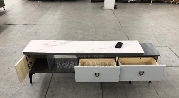 Foreign TV Stand With Drowners · Photo 4