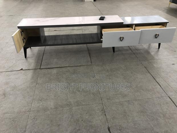 Foreign TV Stand With Drowners · Photo 3