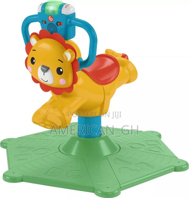 Fisher-Price Bounce Spin Lion Stationary Ride-On, 12m+ · Photo 1