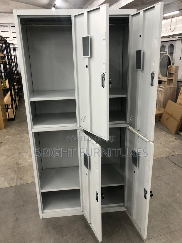 Office Cabinet With Four (4) Lockers · Photo 2