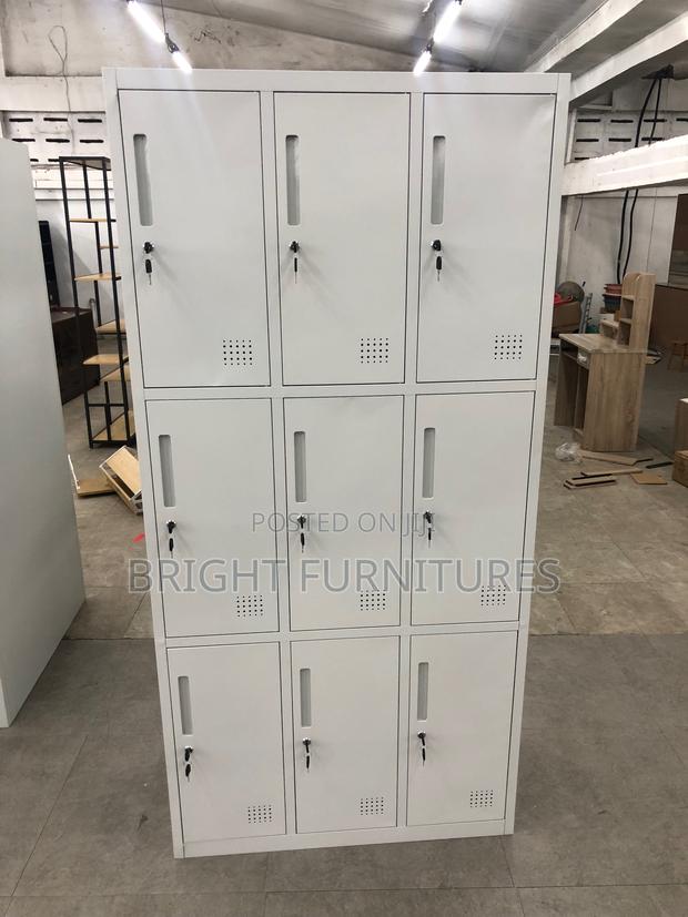 Office Cabinet With Nine (9) Lockers · Photo 1