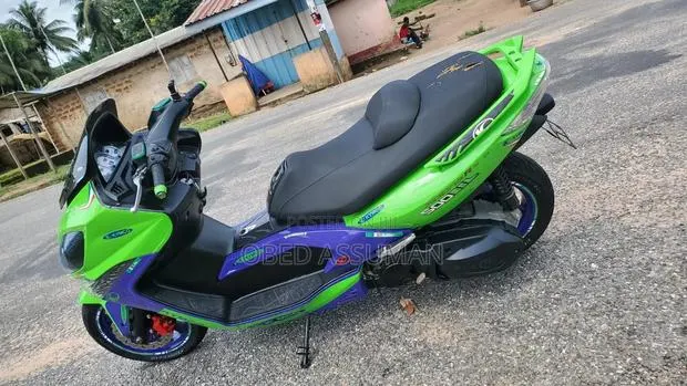 Kymco Xciting 2014 Green · Photo 1