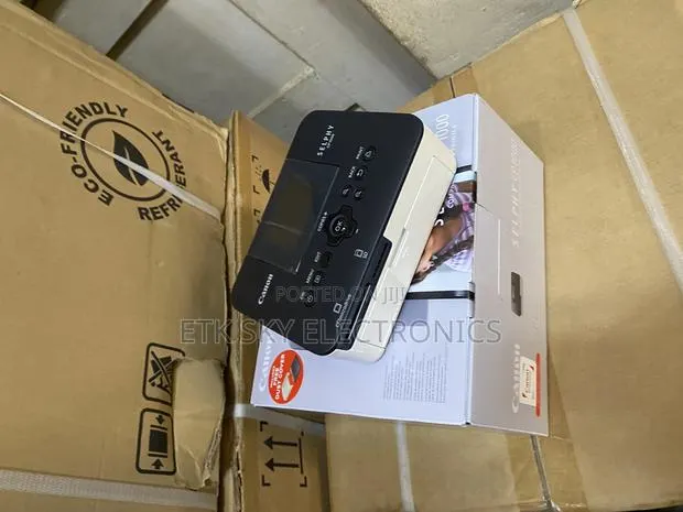 Very Capturing Canon Selphy Compact Photo Printer Cp1000 · Photo 1