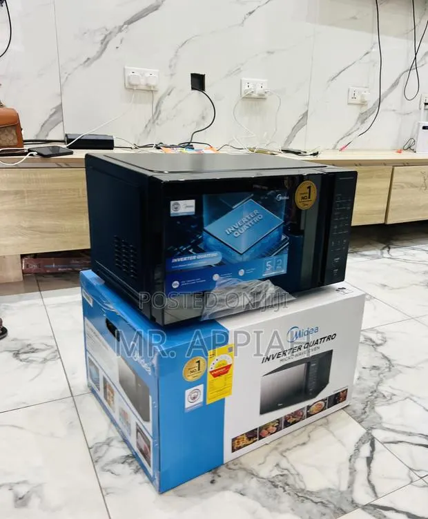 Midea 30Liters Countertop Electric Microwave(Glass). · Photo 1