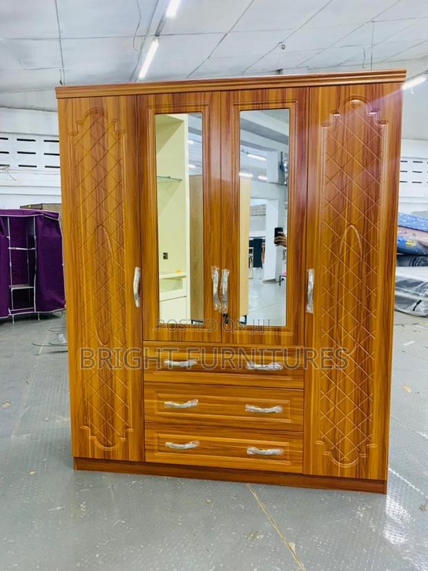 Imported Four Doors Wardrobe With Mirror and Drowners · Photo 1