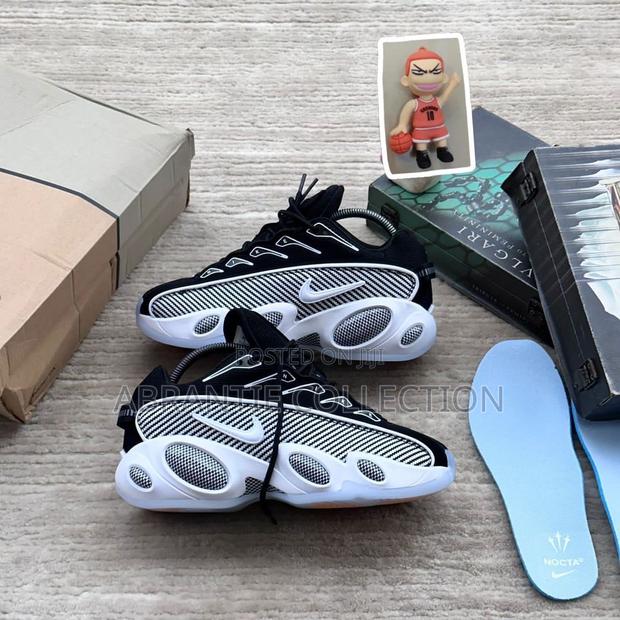 Nike Nocta Glide Sneakers · Photo 1