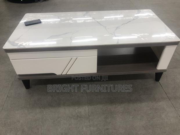 Center Table Is Available for a Cool Price · Photo 1