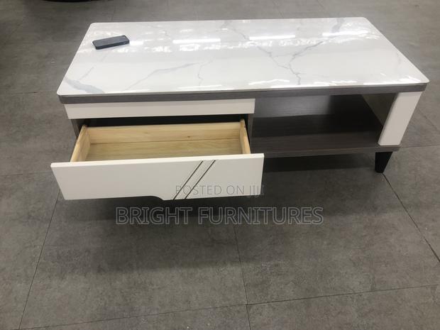 Center Table Is Available for a Cool Price · Photo 2