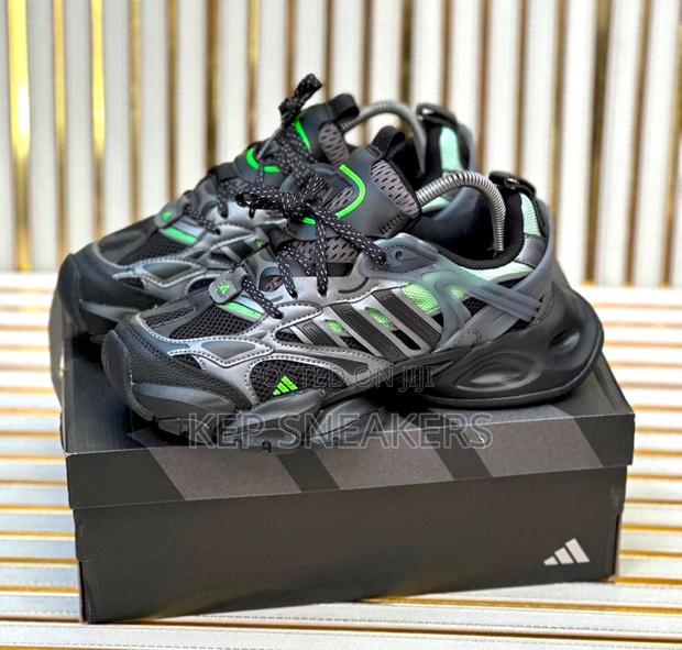 Adidas XLG Runner Deluxe “Black Grey” · Photo 1