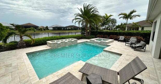 Custom Swimming Pool Design · Photo 1