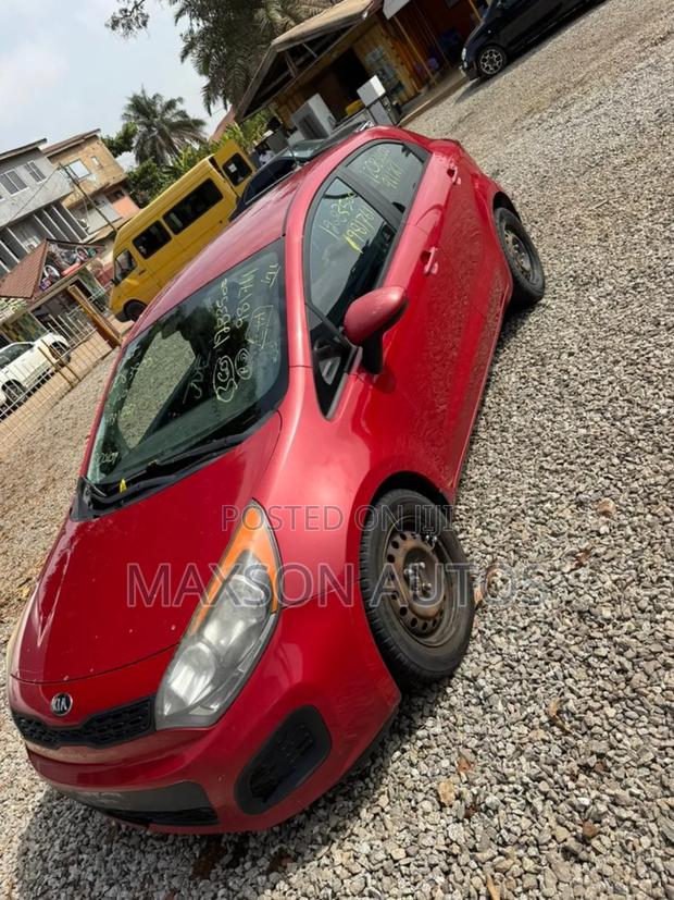 Kia Rio EX 4dr Hatchback (1.6L 4cyl 6A) 2013 Red · Photo 1