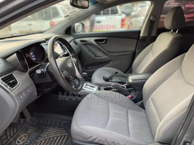 Kia Rio EX 4dr Hatchback (1.6L 4cyl 6A) 2013 Red · Photo 4