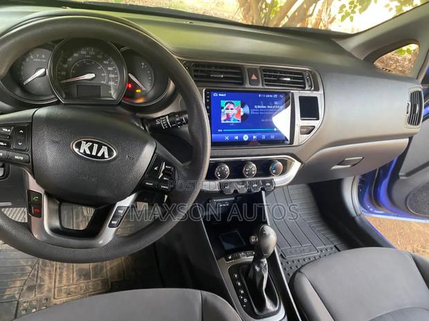 Kia Rio EX 4dr Hatchback (1.6L 4cyl 6A) 2013 Red · Photo 5