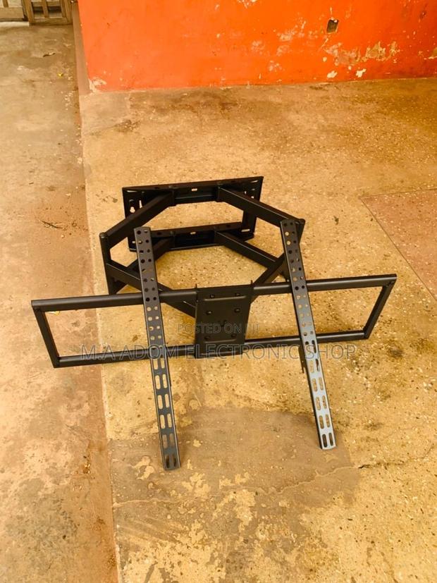 Dominate Your Viewing Angle: Adjustable TV Mount(32”-70”)Tvs · Photo 1