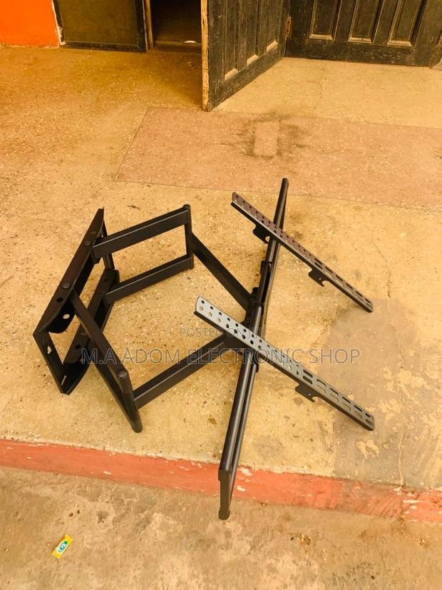Perfect View, Every Time:Adjustable TV Mount for 32"-70" TVS · Photo 1