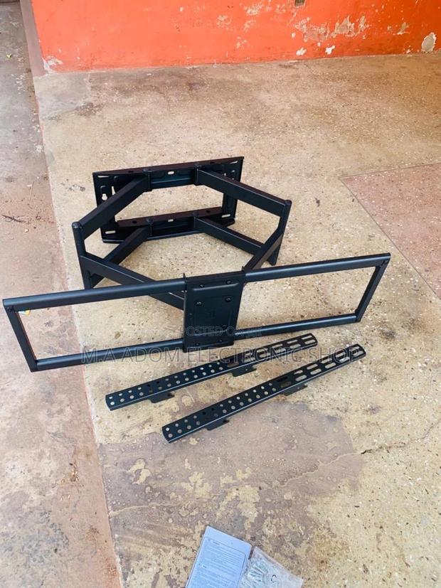 Flex Your Viewing: Adjustable TV Mount for 32"-70" TVS · Photo 1