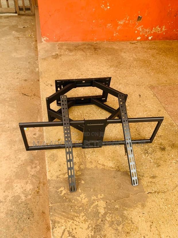Customized Viewing: Adjustable TV Mount for 32”-70” TVS · Photo 1