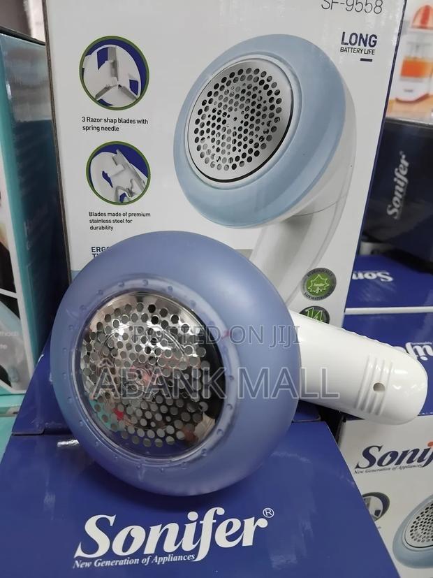 Lint Remover Machine · Photo 1