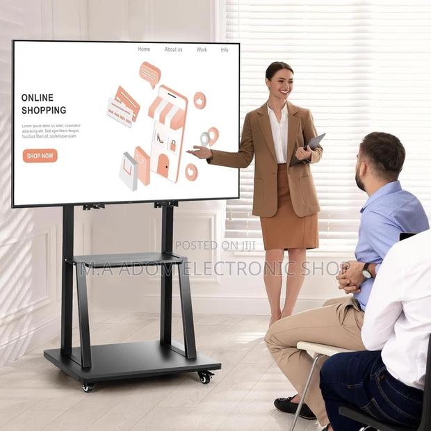 Mobile TV Stand: 32"-75" Tvs, Roll With Ease · Photo 1