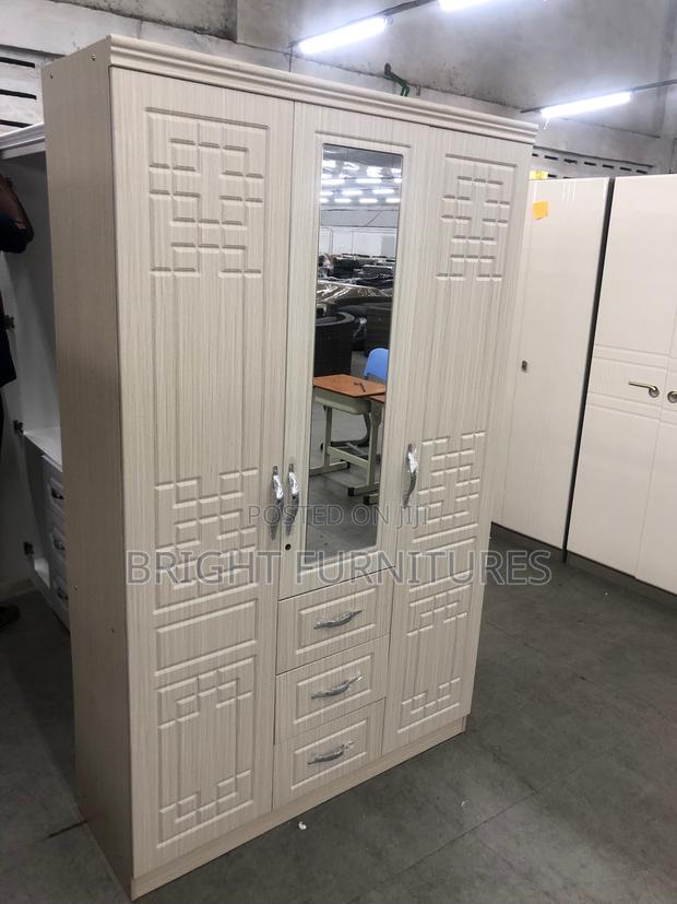 Foreign Three Doors Wardrobe With Drowners and Mirror · Photo 1