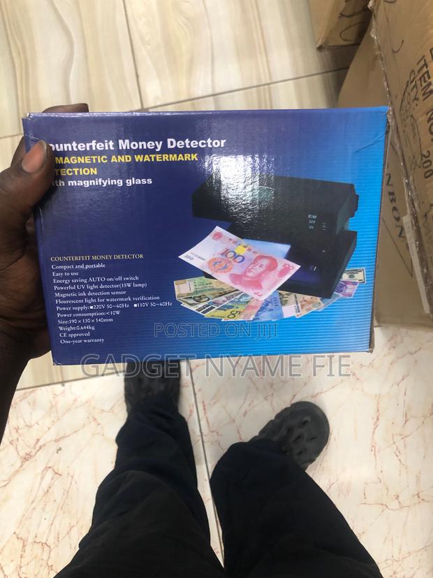 Counterfeit Money Detectors · Photo 1
