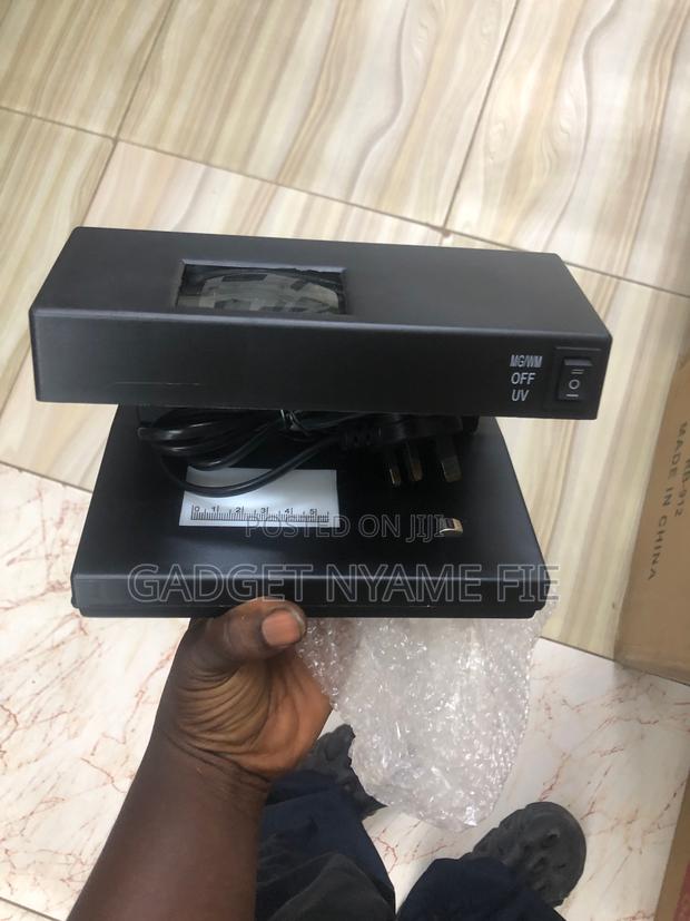 Counterfeit Money Detectors · Photo 2