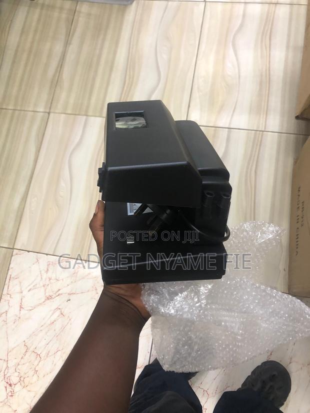 Counterfeit Money Detectors · Photo 3