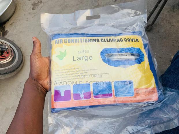 Air Conditioner Cover for Servicing · Photo 1