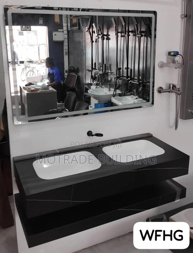 Black Double Cabinet Basin With Led Light And Tap · Photo 1