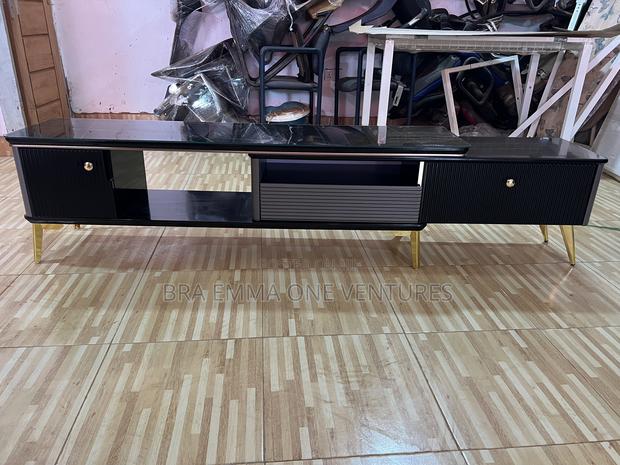 Nicely Designed Tv Stand With Drawers · Photo 1