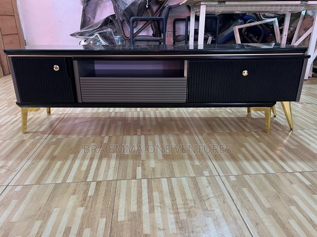 Nicely Designed Tv Stand With Drawers · Photo 2