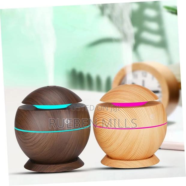 Ultrasonic Aroma Diffuser Humidifier With Color Changing LED · Photo 1