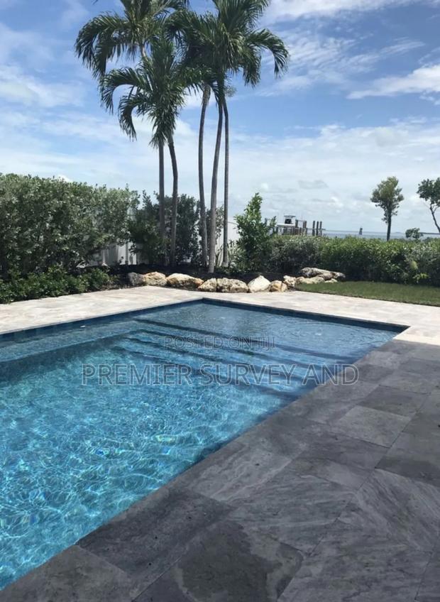 Luxury Yet, Affordable Swimming Pools · Photo 3