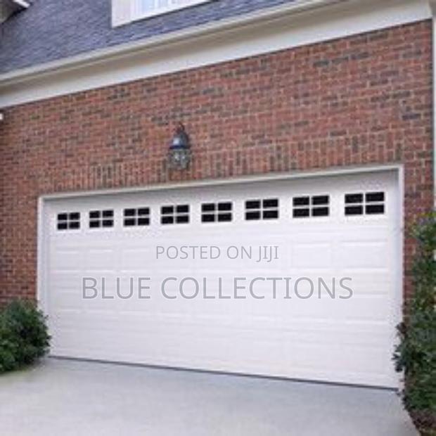 18ft Automated Garage Door · Photo 1