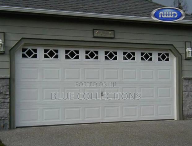 18×8 Canadian Garage Door With Fanlight · Photo 1