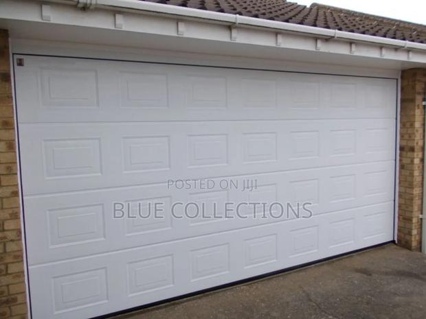 18×8 Stylish Automated Garage Door · Photo 1
