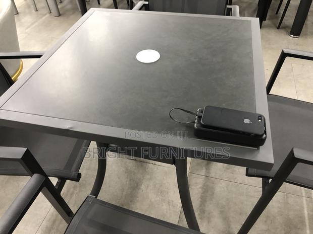 Foreign Quality Outdoor Table With Four Chairs · Photo 2