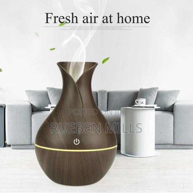 Eco-Friendly Mini Essential Oil Diffuser Humidifier · Photo 1