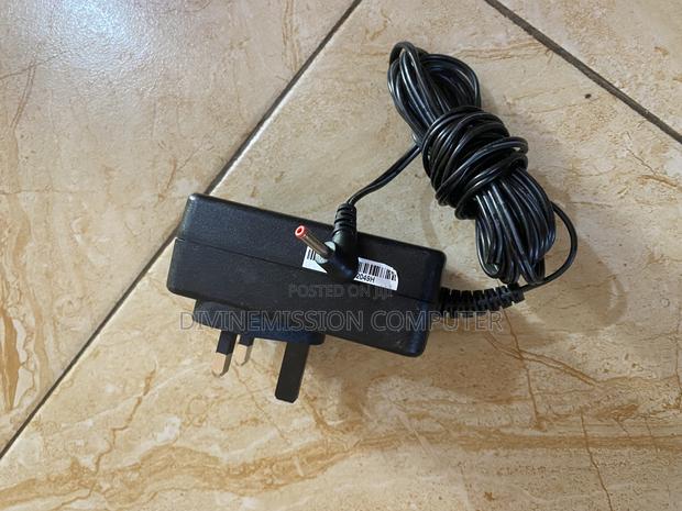 TM1 12v 2A Laptop Charger/Adapter Original. · Photo 7