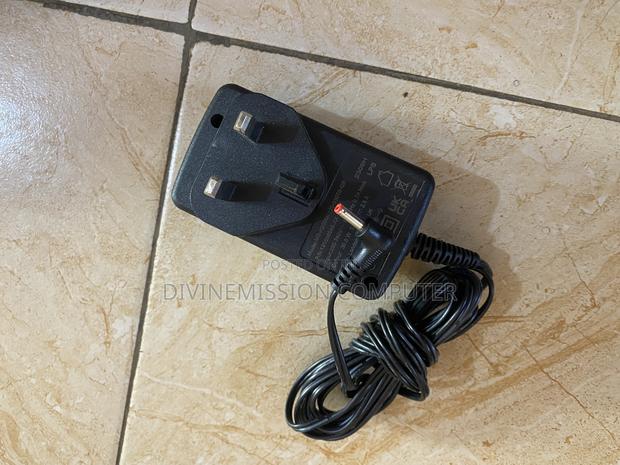 TM1 12v 2A Laptop Charger/Adapter Original. · Photo 1