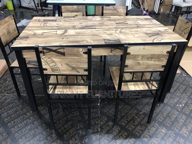 Quality Wooden Dining Table With Six (6) Chairs · Photo 3
