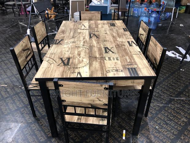 Quality Wooden Dining Table With Six (6) Chairs · Photo 4