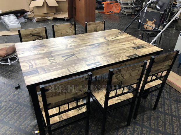 Quality Wooden Dining Table With Six (6) Chairs · Photo 6