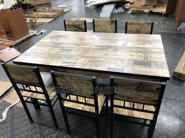 Quality Wooden Dining Table With Six (6) Chairs · Photo 7