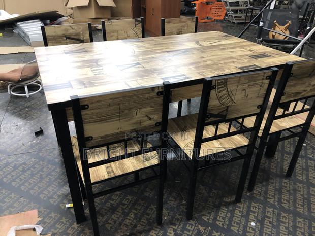 Quality Wooden Dining Table With Six (6) Chairs · Photo 2