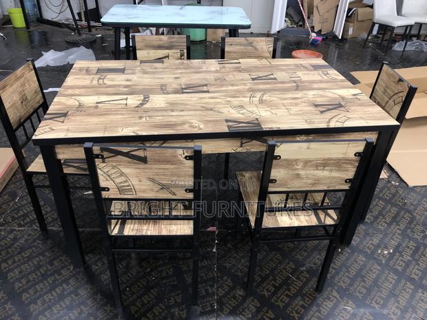 Quality Wooden Dining Table With Six (6) Chairs · Photo 1