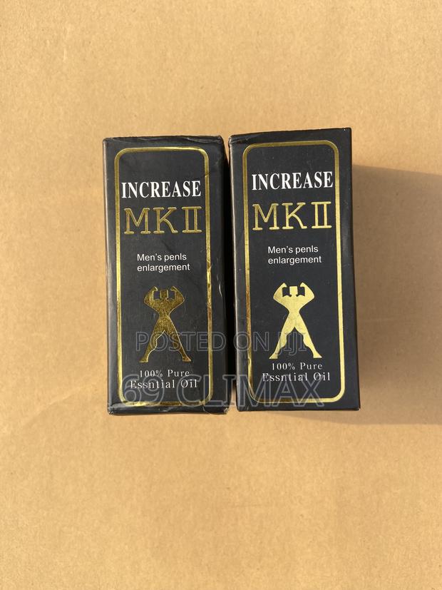 MK Ll Oil - Stay Confident · Photo 1