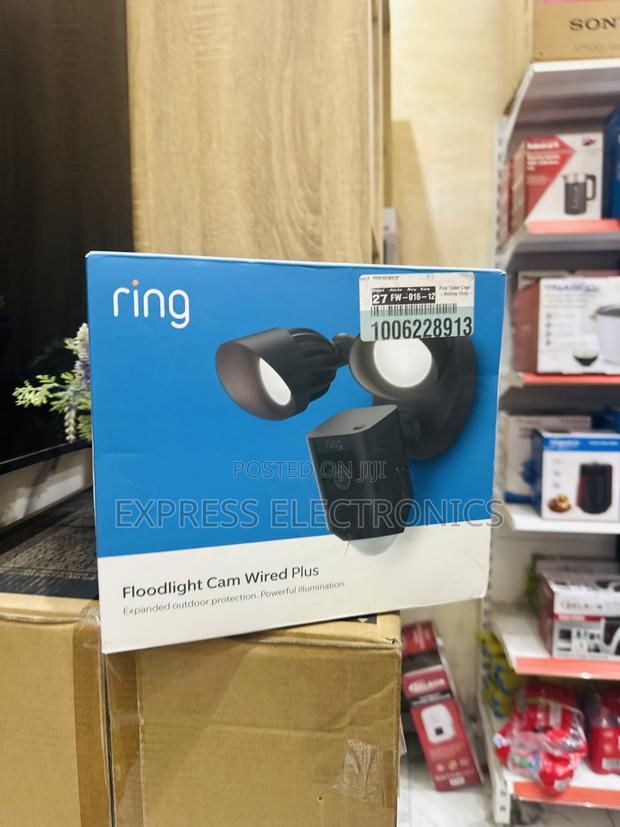 Text Us for Your Ring Floodlight Cam Wired Plus · Photo 1
