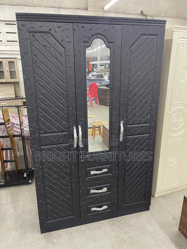 Imported Three Doors Wardrobe With Drawers and Mirror · Photo 1