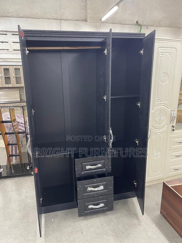 Imported Three Doors Wardrobe With Drawers and Mirror · Photo 3